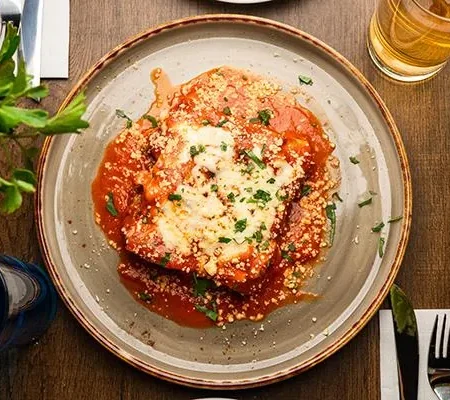 Oven-baked traditional beef lasagna layered with slow-cooked ragu and melted mozzarella